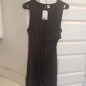 Elegant Black Sleeveless Dress With Side Opening